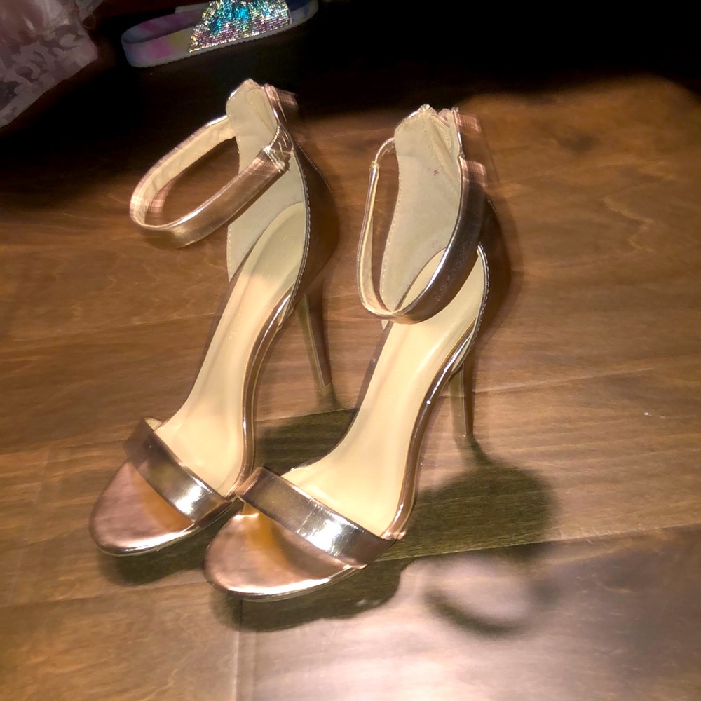 Gold high heels